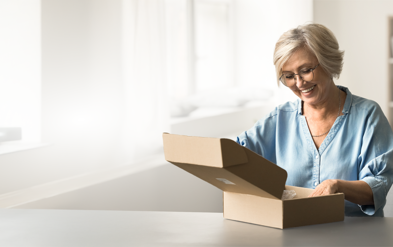old-woman-with-box_25031b0e-110c-4a0c-8c14-f011a86638cf.png
